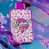Indulge in the sweet, fruity blend of grape jelly and warm donut flavors with Grape Jelly Donuts by Fryd. fryd thc carts